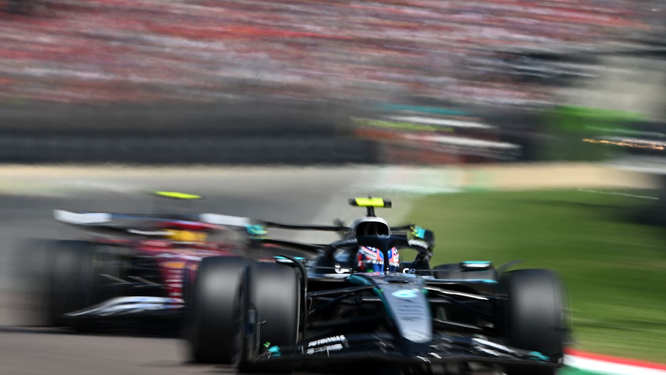 IMOLA, ITALY - MAY 18: Andrea Kimi Antonelli of Italy driving the (12) Mercedes AMG Petronas F1 Team W16 leads Lewis Hamilton of Great Britain driving the (44) Scuderia Ferrari SF-25 on track during the F1 Grand Prix of Emilia-Romagna at Autodromo Internazionale Enzo e Dino Ferrari on May 18, 2025 in Imola, Italy. (Photo by Rudy Carezzevoli/Getty Images)