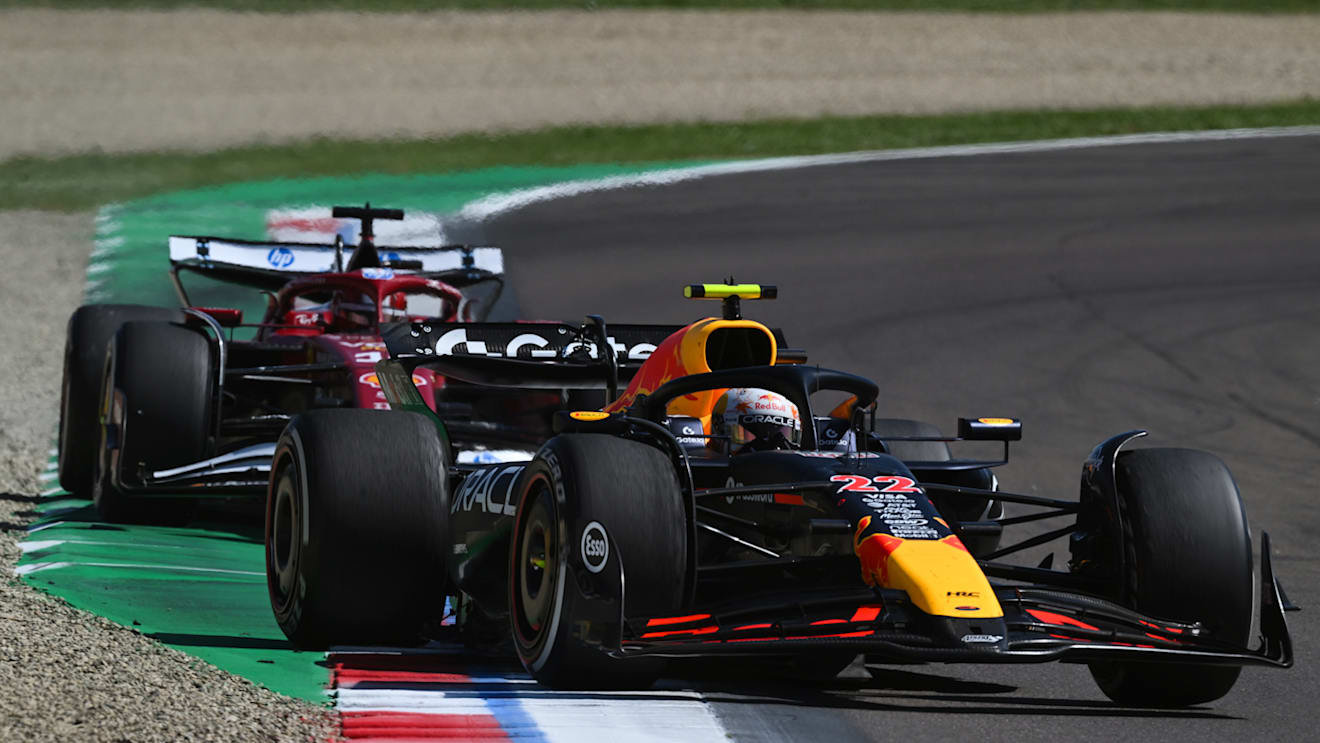IMOLA, ITALY - MAY 18: Yuki Tsunoda of Japan driving the (22) Oracle Red Bull Racing RB21 leads Charles Leclerc of Monaco driving the (16) Scuderia Ferrari SF-25 on track during the F1 Grand Prix of Emilia-Romagna at Autodromo Internazionale Enzo e Dino Ferrari on May 18, 2025 in Imola, Italy. (Photo by Mark Sutton - Formula 1/Formula 1 via Getty Images)