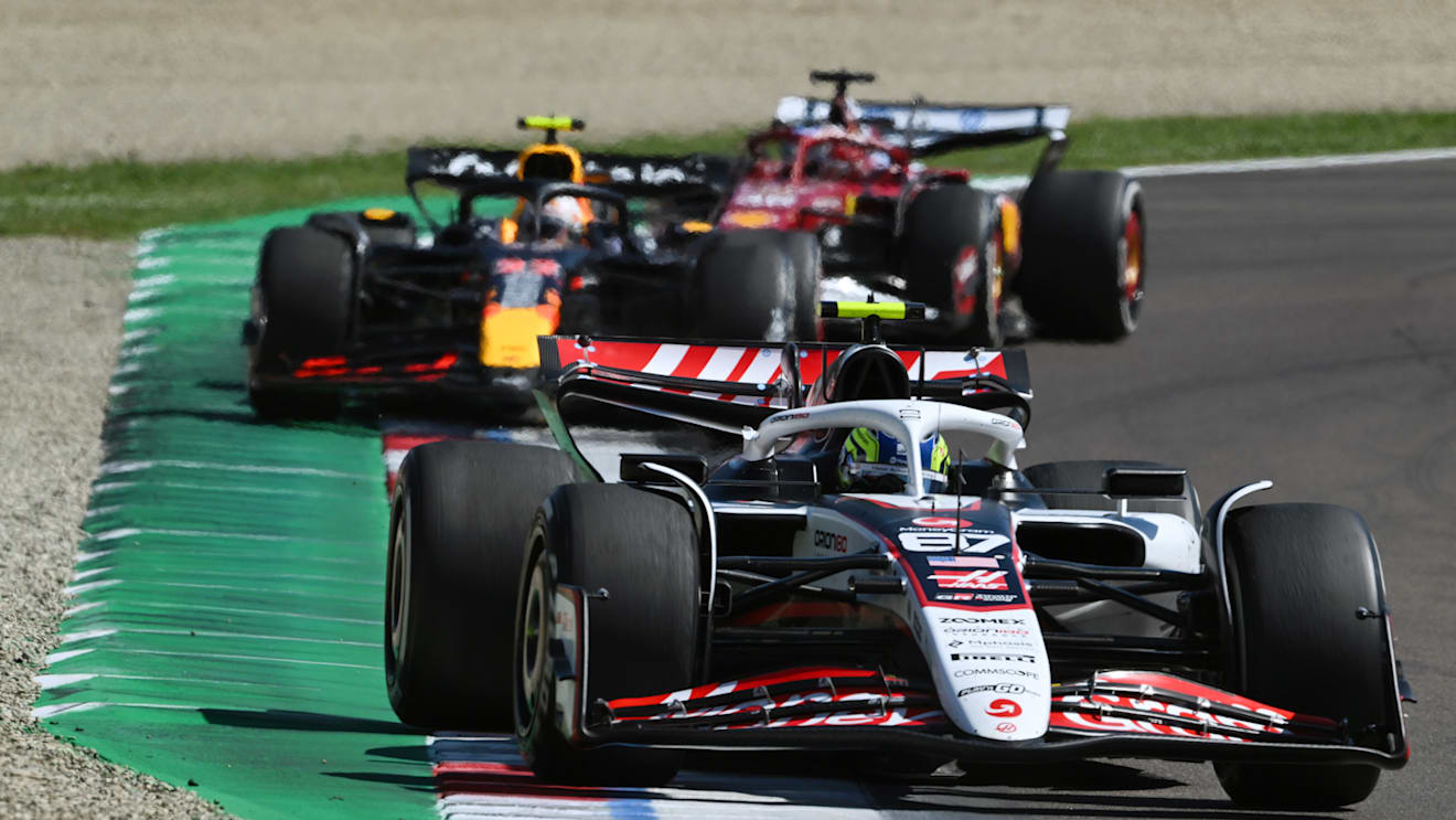 IMOLA, ITALY - MAY 18: Oliver Bearman of Great Britain driving the (87) Haas F1 VF-25 Ferrari leads Yuki Tsunoda of Japan driving the (22) Oracle Red Bull Racing RB21 and Charles Leclerc of Monaco driving the (16) Scuderia Ferrari SF-25 on track during the F1 Grand Prix of Emilia-Romagna at Autodromo Internazionale Enzo e Dino Ferrari on May 18, 2025 in Imola, Italy. (Photo by Mark Sutton - Formula 1/Formula 1 via Getty Images)