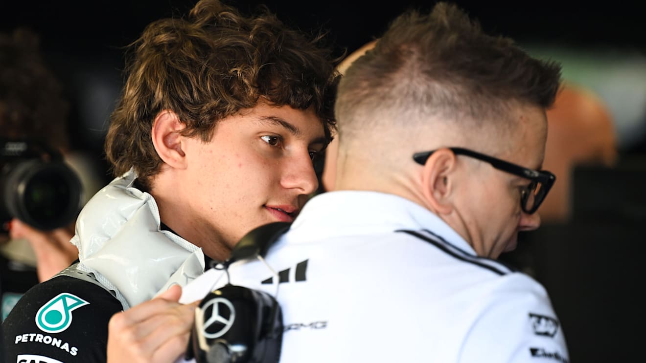 IMOLA, ITALY - MAY 17: Andrea Kimi Antonelli of Italy and Mercedes AMG Petronas F1 Team and Peter Bonnington, Race Engineer of Mercedes AMG Petronas F1 Team in the garage during final practice ahead of the F1 Grand Prix of Emilia-Romagna at Autodromo Internazionale Enzo e Dino Ferrari on May 17, 2025 in Imola, Italy. (Photo by Mark Sutton - Formula 1/Formula 1 via Getty Images)