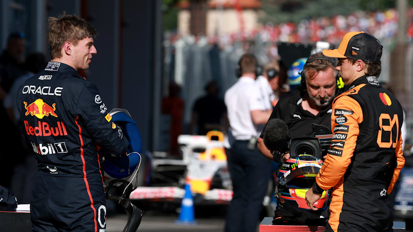 IMOLA, ITALY - MAY 17: Second placed qualifier Max Verstappen of the Netherlands and Oracle Red Bull Racing and Pole position qualifier Oscar Piastri of Australia and McLaren talk in parc ferme during qualifying ahead of the F1 Grand Prix of Emilia-Romagna at Autodromo Internazionale Enzo e Dino Ferrari on May 17, 2025 in Imola, Italy. (Photo by Mark Thompson/Getty Images)
