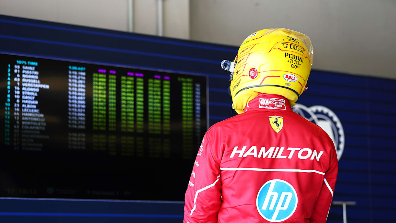 IMOLA, ITALY - MAY 17: Twelfth placed qualifier Lewis Hamilton of Great Britain and Scuderia Ferrari checks the timing screens during qualifying ahead of the F1 Grand Prix of Emilia-Romagna at Autodromo Internazionale Enzo e Dino Ferrari on May 17, 2025 in Imola, Italy. (Photo by Bryn Lennon - Formula 1/Formula 1 via Getty Images)