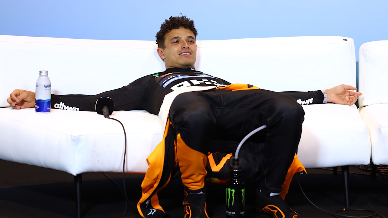 MIAMI, FLORIDA - MAY 04: Second placed Lando Norris of Great Britain and McLaren lays down in the Drivers Press Conference during the F1 Grand Prix of Miami at Miami International Autodrome on May 04, 2025 in Miami, Florida. (Photo by Clive Rose/Getty Images)