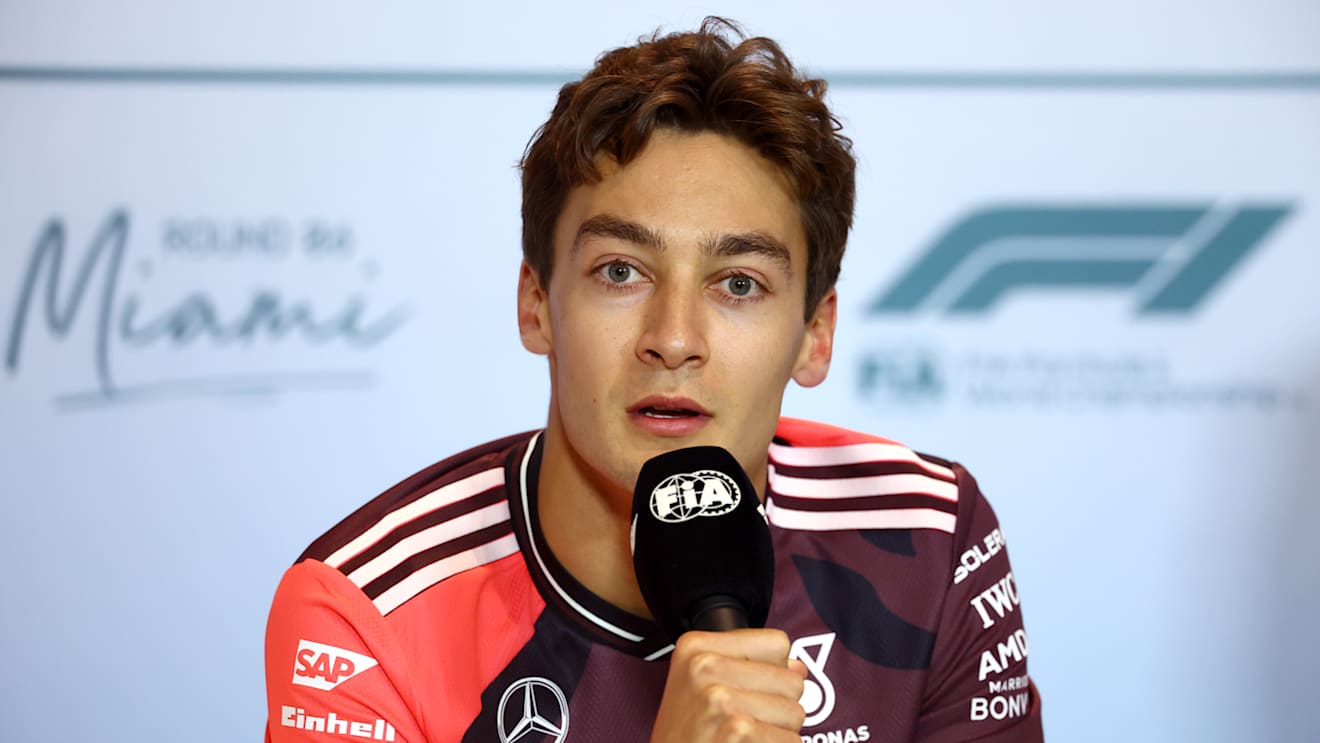 MIAMI, FLORIDA - MAY 01: George Russell of Great Britain and Mercedes AMG Petronas F1 Team speaks in the Drivers Press Conference during previews ahead of the F1 Grand Prix of Miami at Miami International Autodrome on May 01, 2025 in Miami, Florida. (Photo by Clive Rose/Getty Images)