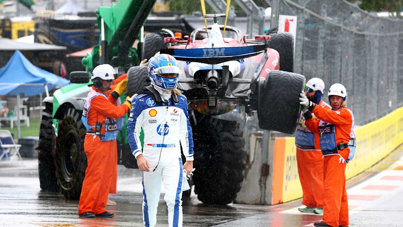 MIAMI, FLORIDA - MAY 03: Marshals remove the car of Charles Leclerc of Monaco driving the (16) Scuderia Ferrari SF-25 from the circuit after a crash on the way to the grid during the Sprint ahead of the F1 Grand Prix of Miami at Miami International Autodrome on May 03, 2025 in Miami, Florida. (Photo by Clive Rose/Getty Images)