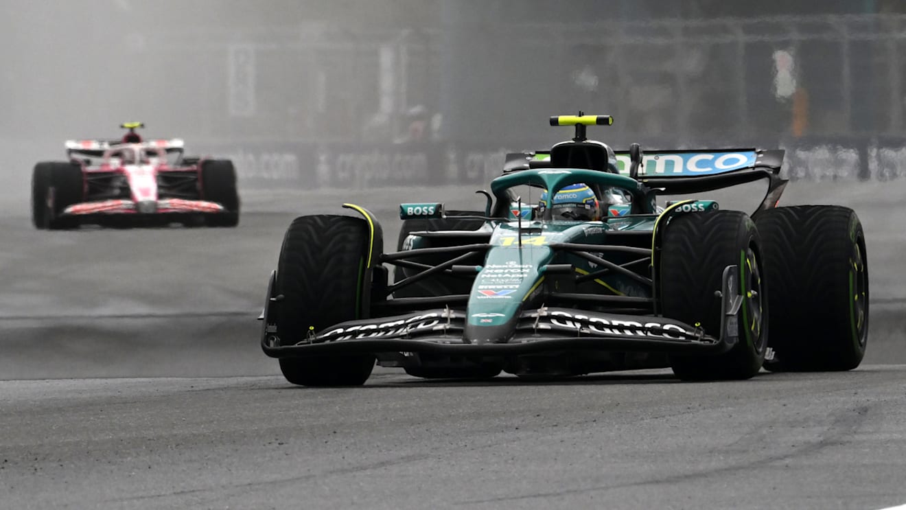 MIAMI, FLORIDA - MAY 03: Fernando Alonso of Spain driving the (14) Aston Martin F1 Team AMR25 Mercedes leads Liam Lawson of New Zealand driving the (30) Visa Cash App Racing Bulls VCARB 02 on track during the Sprint ahead of the F1 Grand Prix of Miami at Miami International Autodrome on May 03, 2025 in Miami, Florida. (Photo by Mark Sutton - Formula 1/Formula 1 via Getty Images)