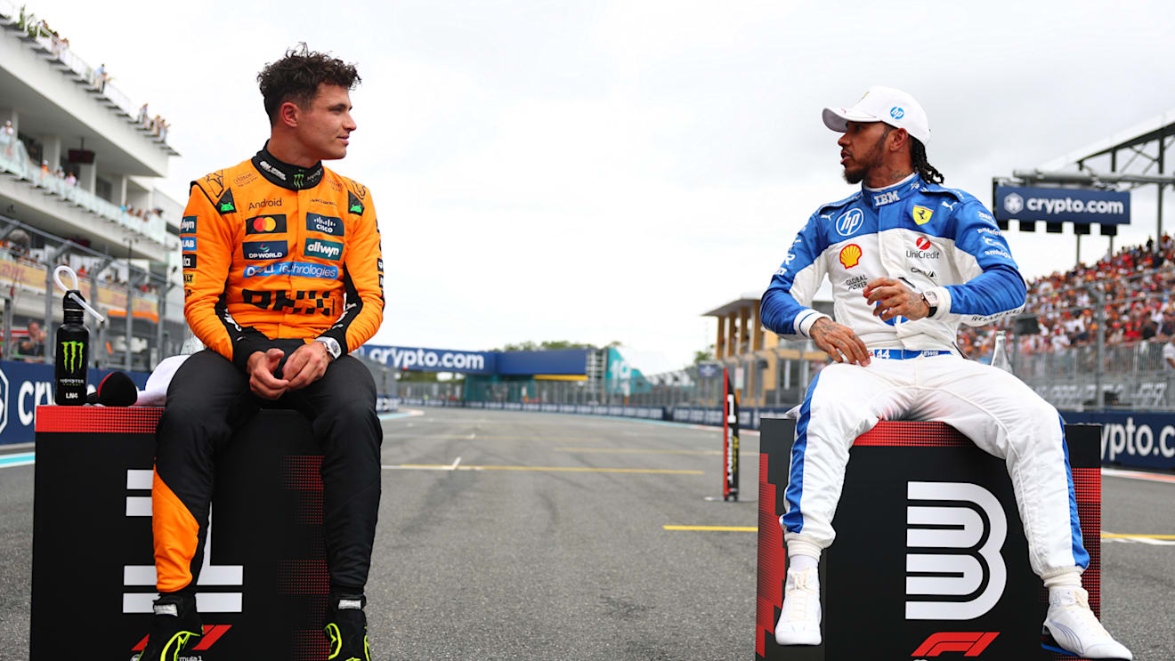 MIAMI, FLORIDA - MAY 03: Sprint winner Lando Norris of Great Britain and McLaren and Third placed Lewis Hamilton of Great Britain and Scuderia Ferrari talk in parc ferme during the Sprint ahead of the F1 Grand Prix of Miami at Miami International Autodrome on May 03, 2025 in Miami, Florida. (Photo by Bryn Lennon - Formula 1/Formula 1 via Getty Images)