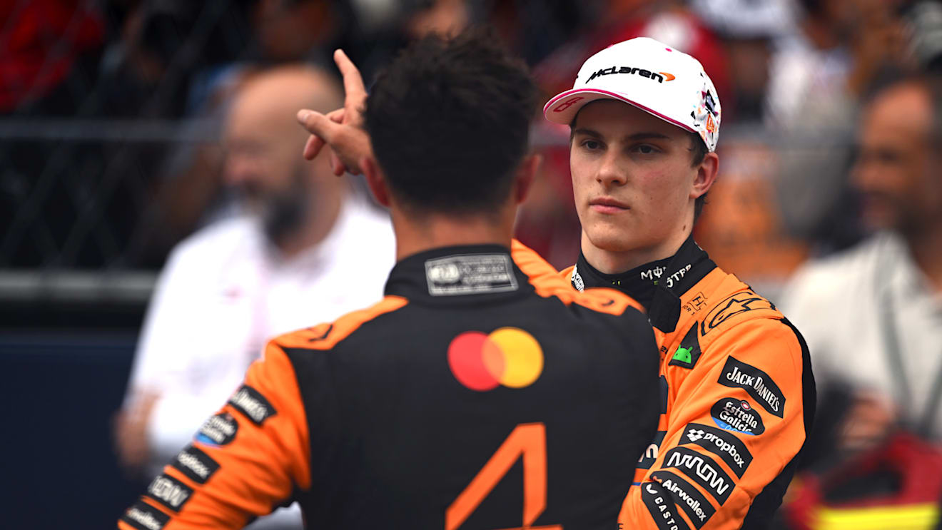 MIAMI, FLORIDA - MAY 03: Second placed Oscar Piastri of Australia and McLaren and Sprint winner Lando Norris of Great Britain and McLaren talk in parc ferme during the Sprint ahead of the F1 Grand Prix of Miami at Miami International Autodrome on May 03, 2025 in Miami, Florida. (Photo by Rudy Carezzevoli/Getty Images)