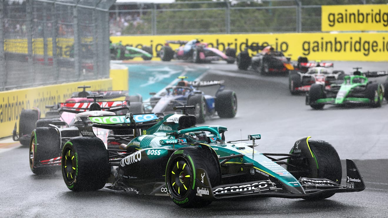 MIAMI, FLORIDA - MAY 03: Lance Stroll of Canada driving the (18) Aston Martin F1 Team AMR25 Mercedes leads Esteban Ocon of France driving the (31) Haas F1 VF-25 Ferrari and Pierre Gasly of France driving the (10) Alpine F1 A525 Renault on track during the Sprint ahead of the F1 Grand Prix of Miami at Miami International Autodrome on May 03, 2025 in Miami, Florida. (Photo by Clive Rose/Getty Images)