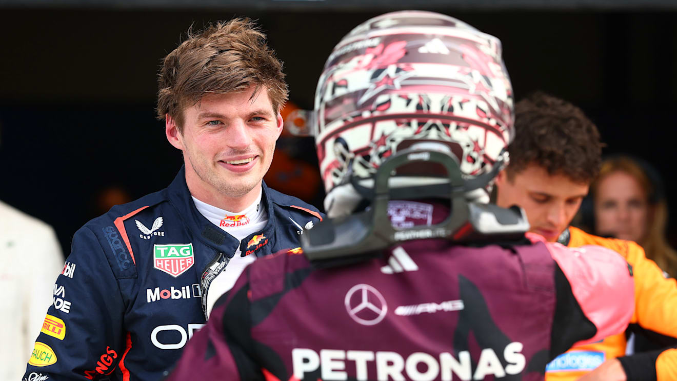 MIAMI, FLORIDA - MAY 03: Pole position qualifier Max Verstappen of the Netherlands and Oracle Red Bull Racing and Third placed qualifier Andrea Kimi Antonelli of Italy and Mercedes AMG Petronas F1 Team talk in parc ferme during qualifying ahead of the F1 Grand Prix of Miami at Miami International Autodrome on May 03, 2025 in Miami, Florida. (Photo by Mark Thompson/Getty Images)