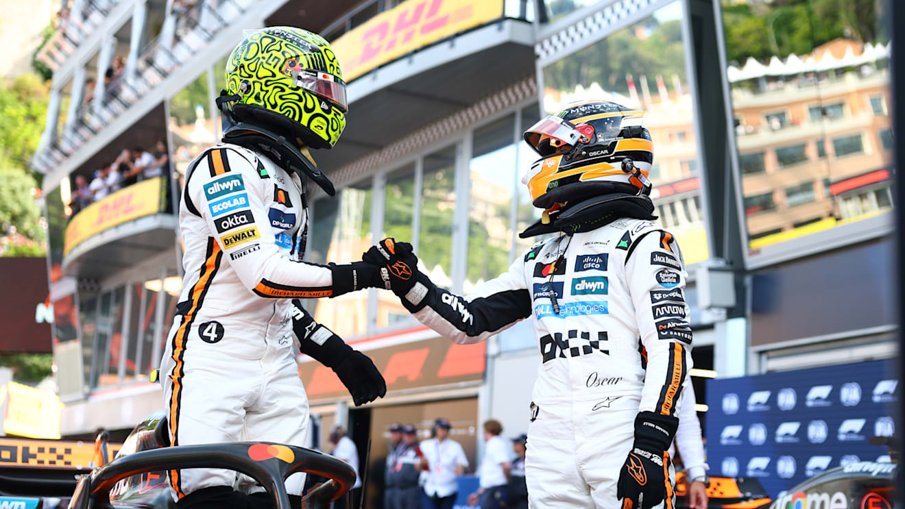 MONTE-CARLO, MONACO - MAY 24: Pole position qualifier Lando Norris of Great Britain and McLaren and Third placed qualifier Oscar Piastri of Australia and McLaren congratulate each other in parc ferme during qualifying ahead of the F1 Grand Prix of Monaco at Circuit de Monaco on May 24, 2025 in Monte-Carlo, Monaco (Photo by Bryn Lennon - Formula 1/Formula 1 via Getty Images)