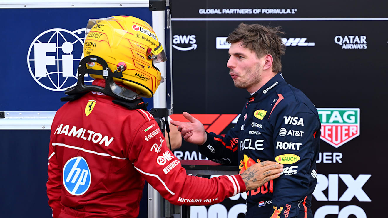 MONTE-CARLO, MONACO - MAY 24: Fourth placed qualifier Lewis Hamilton of Great Britain and Scuderia Ferrari and Fifth placed qualifier Max Verstappen of the Netherlands and Oracle Red Bull Racing talk in parc ferme during qualifying ahead of the F1 Grand Prix of Monaco at Circuit de Monaco on May 24, 2025 in Monte-Carlo, Monaco (Photo by Mark Sutton - Formula 1/Formula 1 via Getty Images)