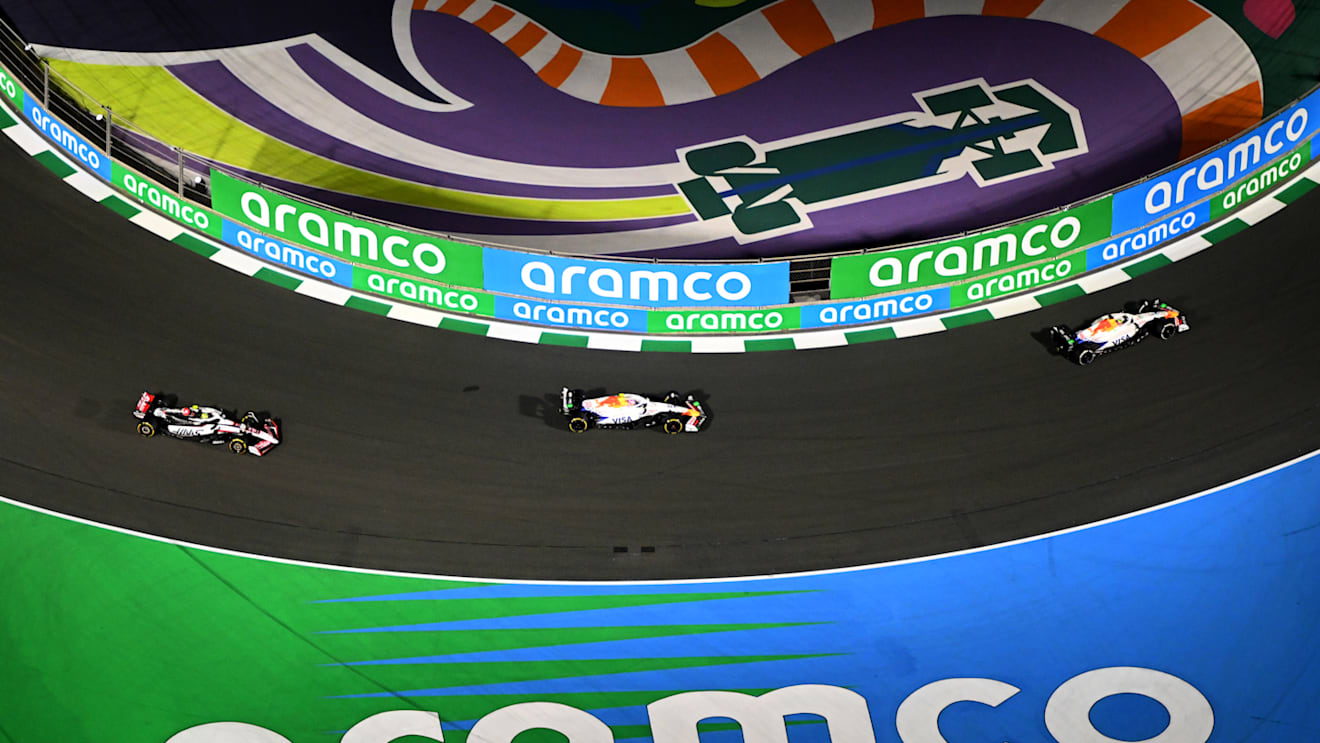 JEDDAH, SAUDI ARABIA - APRIL 20: Isack Hadjar of France driving the (6) Visa Cash App Racing Bulls VCARB 02 leads Lewis Hamilton of Great Britain driving the (44) Scuderia Ferrari SF-25 and Oliver Bearman of Great Britain driving the (87) Haas F1 VF-25 Ferrari on track during the F1 Grand Prix of Saudi Arabia at Jeddah Corniche Circuit on April 20, 2025 in Jeddah, Saudi Arabia. (Photo by Clive Mason/Getty Images)