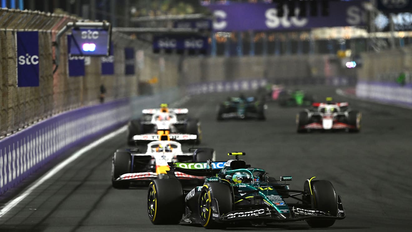 JEDDAH, SAUDI ARABIA - APRIL 20: Fernando Alonso of Spain driving the (14) Aston Martin F1 Team AMR25 Mercedes leads Isack Hadjar of France driving the (6) Visa Cash App Racing Bulls VCARB 02 and Liam Lawson of New Zealand driving the (30) Visa Cash App Racing Bulls VCARB 02 on track during the F1 Grand Prix of Saudi Arabia at Jeddah Corniche Circuit on April 20, 2025 in Jeddah, Saudi Arabia. (Photo by Mark Sutton - Formula 1/Formula 1 via Getty Images)