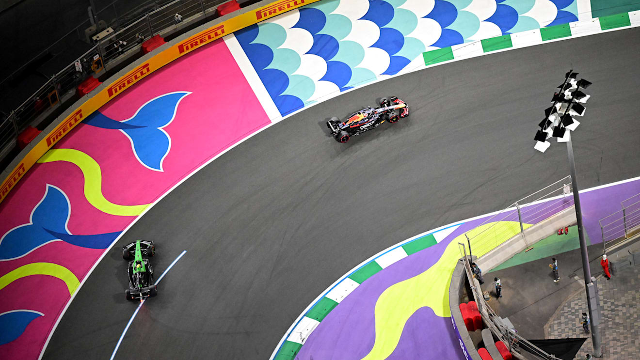 JEDDAH, SAUDI ARABIA - APRIL 19: Max Verstappen of the Netherlands driving the (1) Oracle Red Bull Racing RB21 passes as Gabriel Bortoleto of Brazil driving the (5) Kick Sauber C45 Ferrari recovers from a spin during qualifying ahead of the F1 Grand Prix of Saudi Arabia at Jeddah Corniche Circuit on April 19, 2025 in Jeddah, Saudi Arabia. (Photo by Pauline Ballet - Formula 1/Formula 1 via Getty Images)