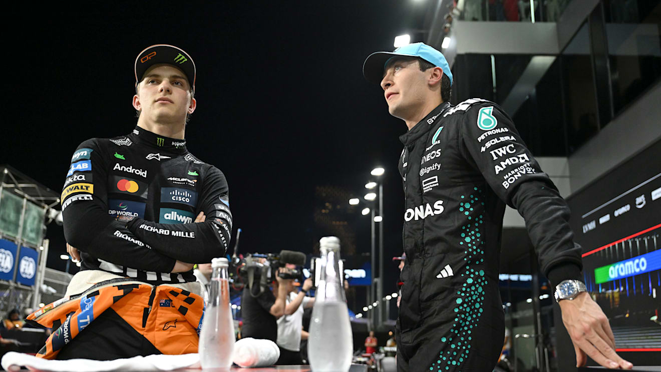 JEDDAH, SAUDI ARABIA - APRIL 19: Second placed qualifier Oscar Piastri of Australia and McLaren and Third placed qualifier George Russell of Great Britain and Mercedes AMG Petronas F1 Team talk in parc ferme during qualifying ahead of the F1 Grand Prix of Saudi Arabia at Jeddah Corniche Circuit on April 19, 2025 in Jeddah, Saudi Arabia. (Photo by Mark Sutton - Formula 1/Formula 1 via Getty Images)