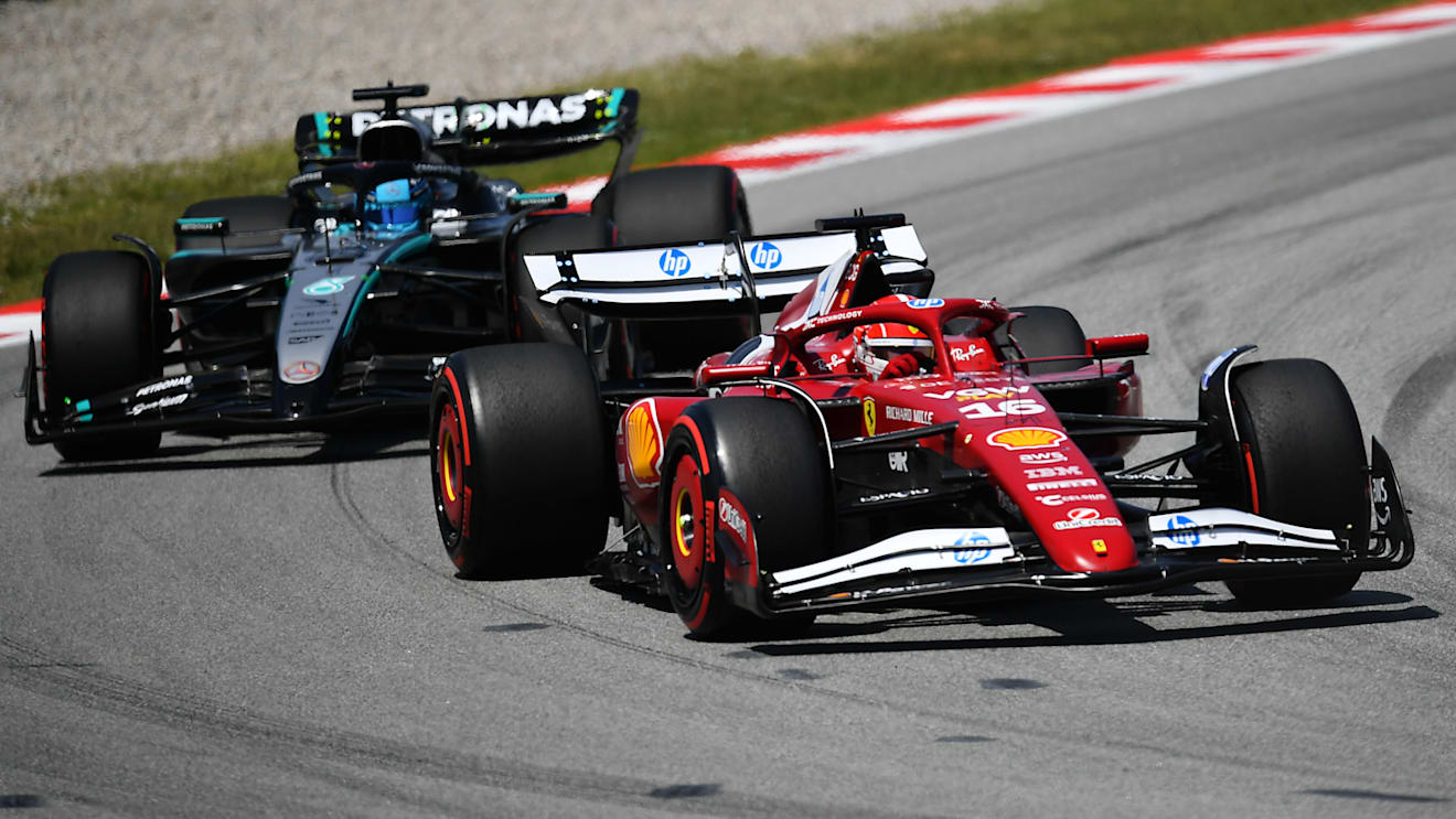 BARCELONA, SPAIN - JUNE 01: Charles Leclerc of Monaco driving the (16) Scuderia Ferrari SF-25 leads George Russell of Great Britain driving the (63) Mercedes AMG Petronas F1 Team W16 on track during the F1 Grand Prix of Spain at Circuit de Barcelona-Catalunya on June 01, 2025 in Barcelona, Spain. (Photo by James Sutton - Formula 1/Formula 1 via Getty Images)