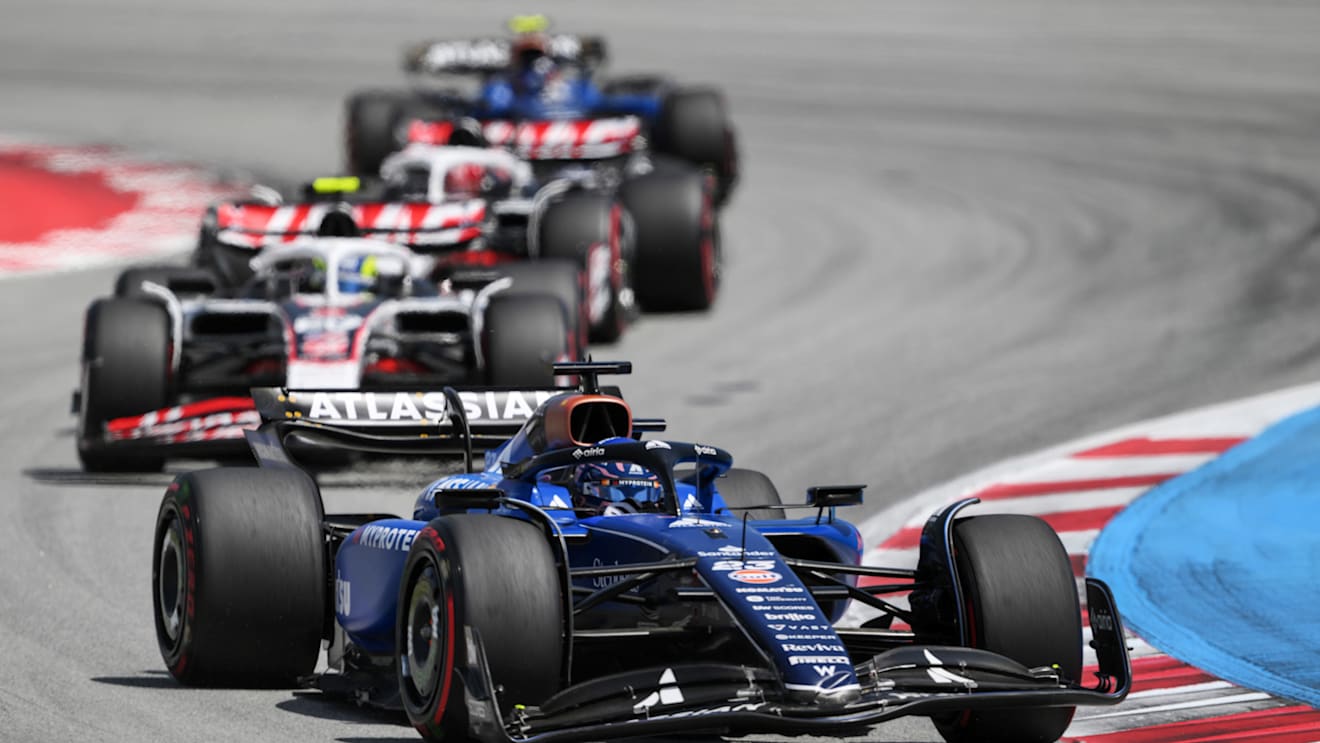 BARCELONA, SPAIN - JUNE 01: Alexander Albon of Thailand driving the (23) Williams FW47 Mercedes leads Oliver Bearman of Great Britain driving the (87) Haas F1 VF-25 Ferrari and Esteban Ocon of France driving the (31) Haas F1 VF-25 Ferrari on track during the F1 Grand Prix of Spain at Circuit de Barcelona-Catalunya on June 01, 2025 in Barcelona, Spain. (Photo by David Ramos/Getty Images)