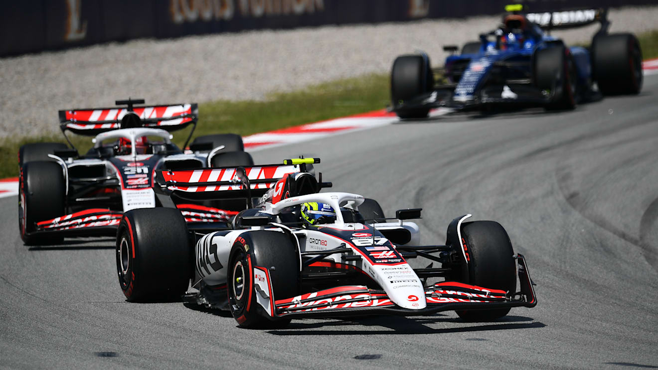 BARCELONA, SPAIN - JUNE 01: Oliver Bearman of Great Britain driving the (87) Haas F1 VF-25 Ferrari leads Esteban Ocon of France driving the (31) Haas F1 VF-25 Ferrari on track during the F1 Grand Prix of Spain at Circuit de Barcelona-Catalunya on June 01, 2025 in Barcelona, Spain. (Photo by James Sutton - Formula 1/Formula 1 via Getty Images)