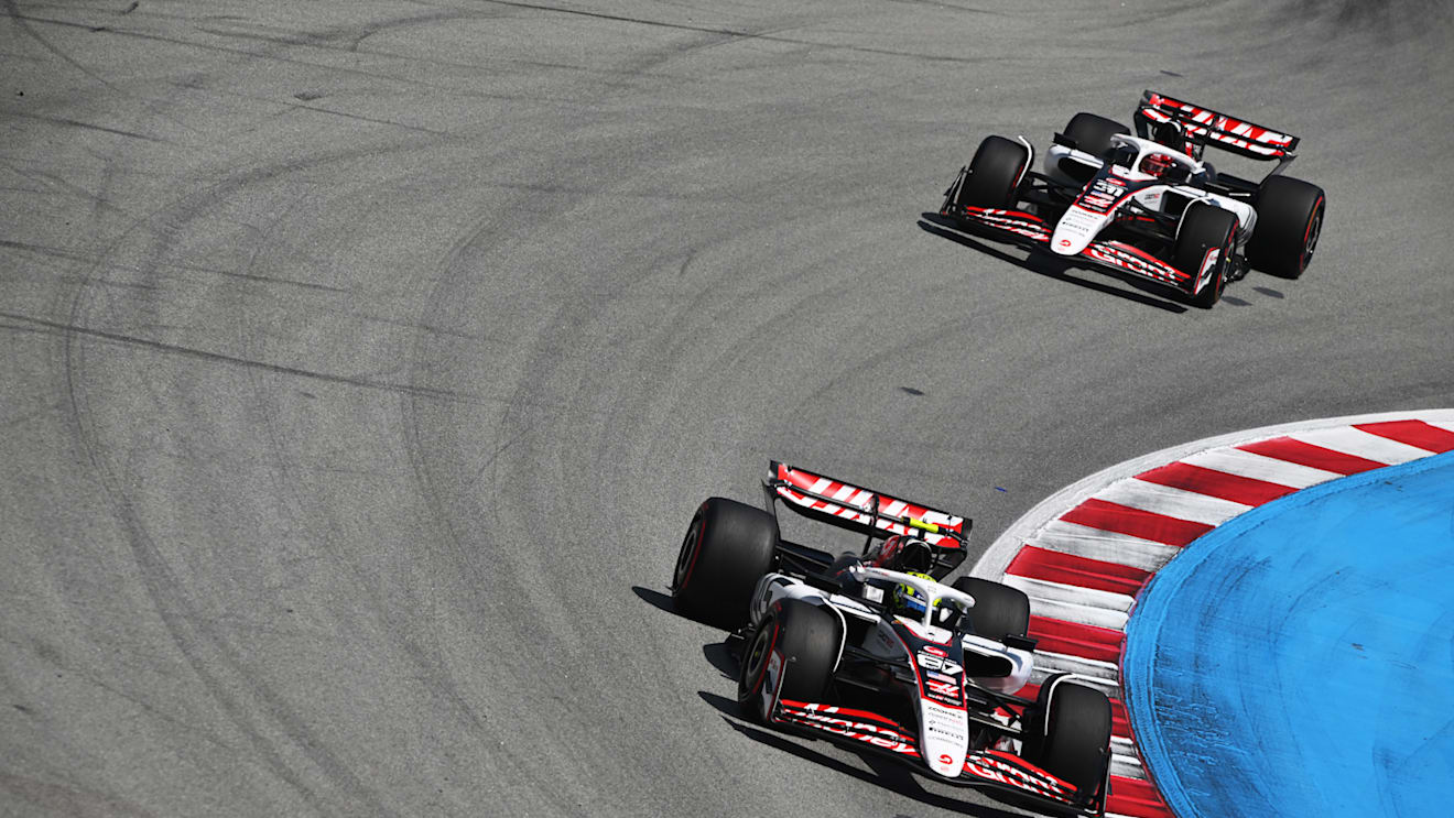 BARCELONA, SPAIN - JUNE 01: Oliver Bearman of Great Britain driving the (87) Haas F1 VF-25 Ferrari leads Esteban Ocon of France driving the (31) Haas F1 VF-25 Ferrari on track during the F1 Grand Prix of Spain at Circuit de Barcelona-Catalunya on June 01, 2025 in Barcelona, Spain. (Photo by Rudy Carezzevoli/Getty Images)