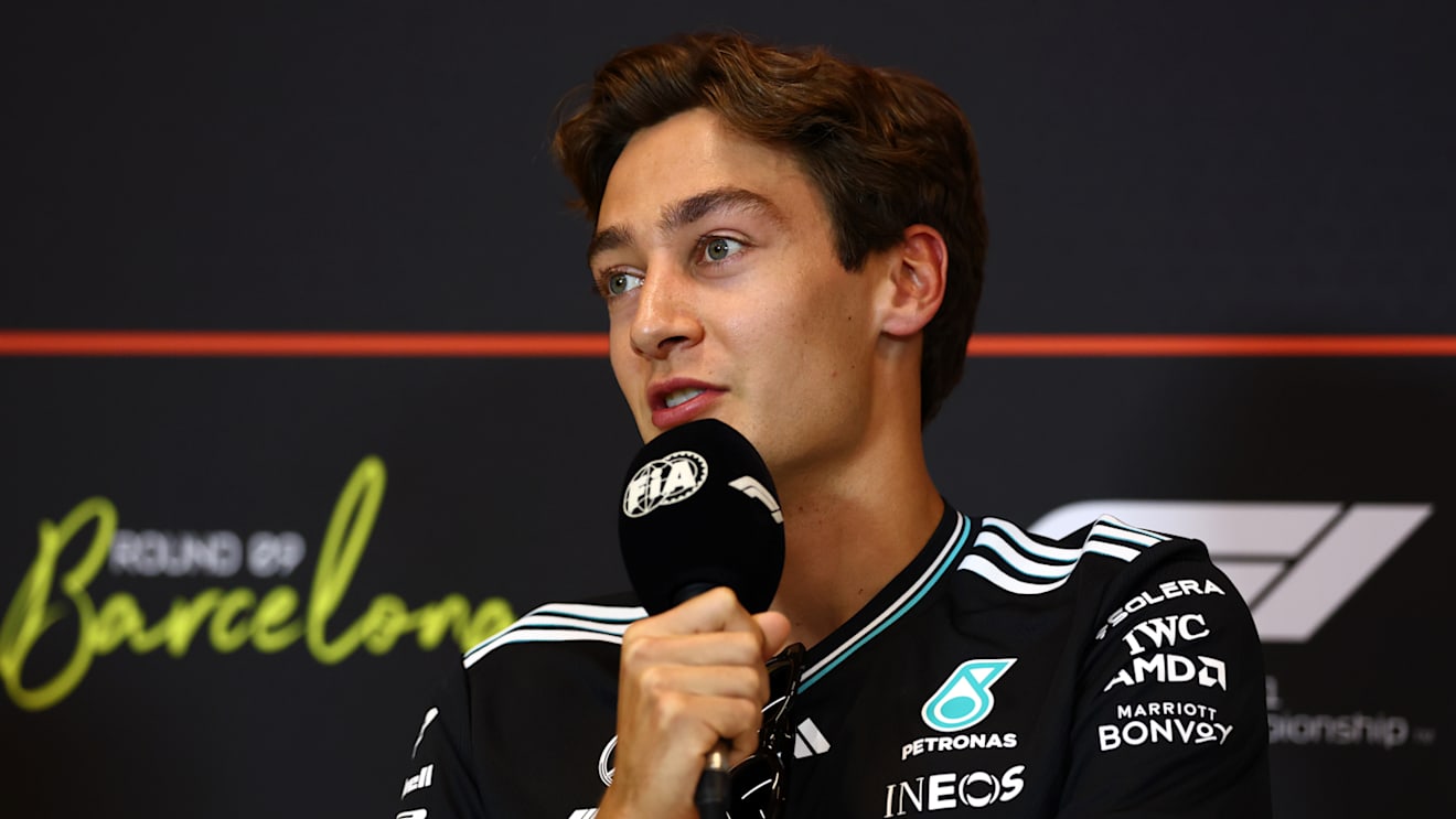 BARCELONA, SPAIN - MAY 29: George Russell of Great Britain and Mercedes AMG Petronas F1 Team speaks in the Drivers Press Conference during previews ahead of the F1 Grand Prix of Spain at Circuit de Barcelona-Catalunya on May 29, 2025 in Barcelona, Spain. (Photo by Clive Rose/Getty Images)