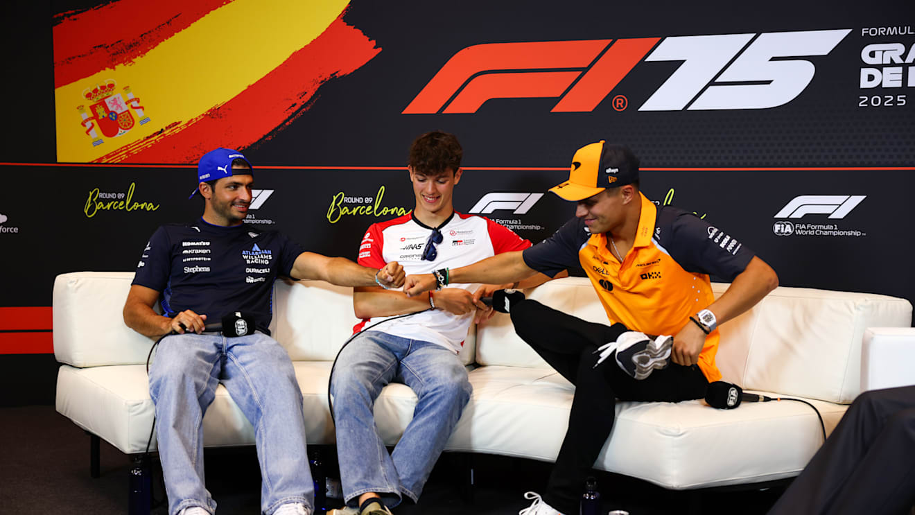 BARCELONA, SPAIN - MAY 29: Carlos Sainz of Spain and Williams, Oliver Bearman of Great Britain and Haas F1 and Lando Norris of Great Britain and McLaren in the Drivers Press Conference during previews ahead of the F1 Grand Prix of Spain at Circuit de Barcelona-Catalunya on May 29, 2025 in Barcelona, Spain. (Photo by Clive Rose/Getty Images)