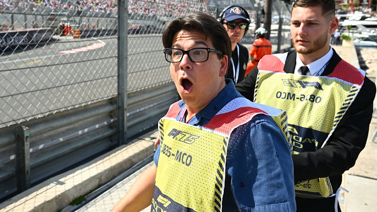 Comedian Michael McIntyre takes in the speed trackside during Qualifying