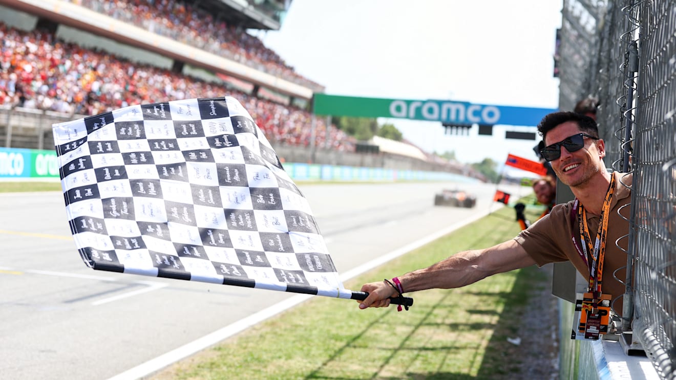 Robert Lewandowski waved the chequered flag at the end of the Spanish Grand Prix