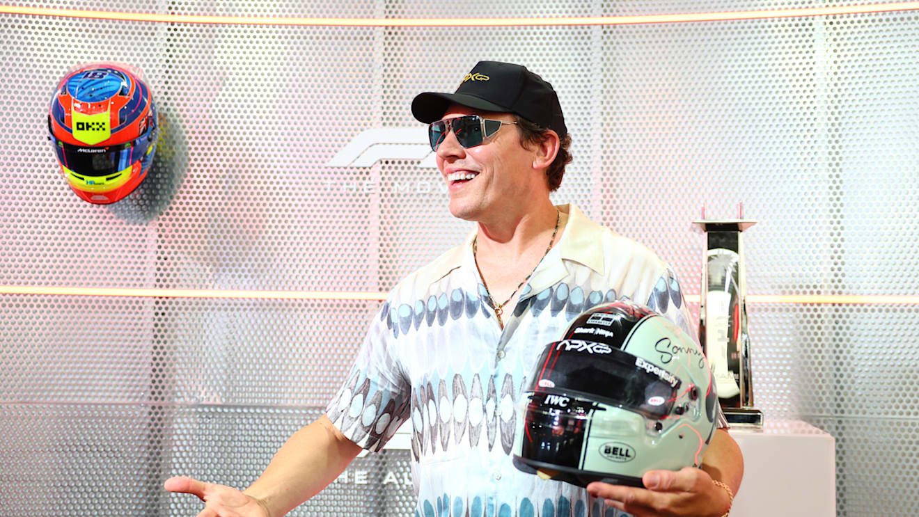 Tiesto visits the 'F1' movie display prior to the Miami Grand Prix
