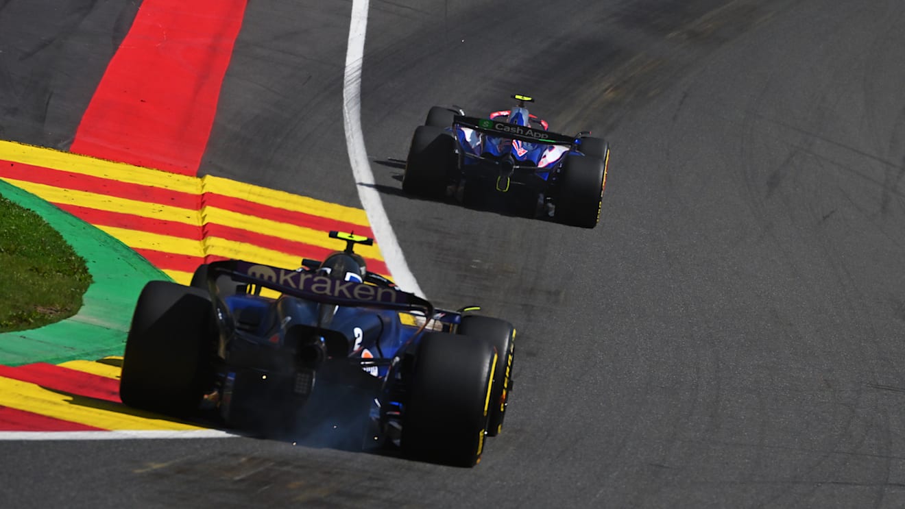 SPA, BELGIUM - JULY 28: Yuki Tsunoda of Japan driving the (22) Visa Cash App RB VCARB 01 leads Logan Sargeant of United States driving the (2) Williams FW46 Mercedes on track during the F1 Grand Prix of Belgium at Circuit de Spa-Francorchamps on July 28, 2024 in Spa, Belgium. (Photo by Rudy Carezzevoli/Getty Images)