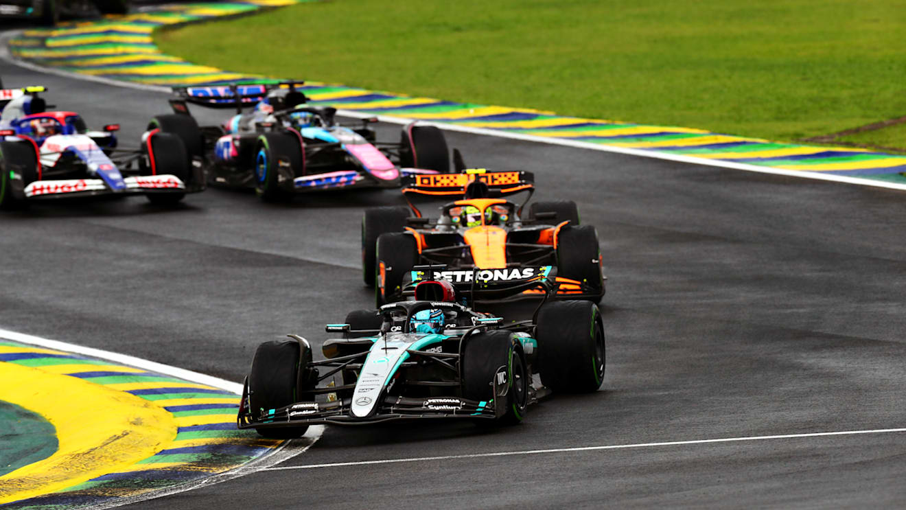 SAO PAULO, BRAZIL - NOVEMBER 03: George Russell of Great Britain driving the (63) Mercedes AMG Petronas F1 Team W15 leads Lando Norris of Great Britain driving the (4) McLaren MCL38 Mercedes at the start during the F1 Grand Prix of Brazil at Autodromo Jose Carlos Pace on November 03, 2024 in Sao Paulo, Brazil. (Photo by Peter Fox - Formula 1/Formula 1 via Getty Images)