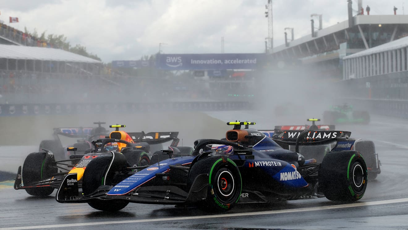 MONTREAL, QUEBEC - JUNE 09: Logan Sargeant of United States driving the (2) Williams FW46 Mercedes leads Sergio Perez of Mexico driving the (11) Oracle Red Bull Racing RB20 on track during the F1 Grand Prix of Canada at Circuit Gilles Villeneuve on June 09, 2024 in Montreal, Quebec. (Photo by Chris Graythen/Getty Images)