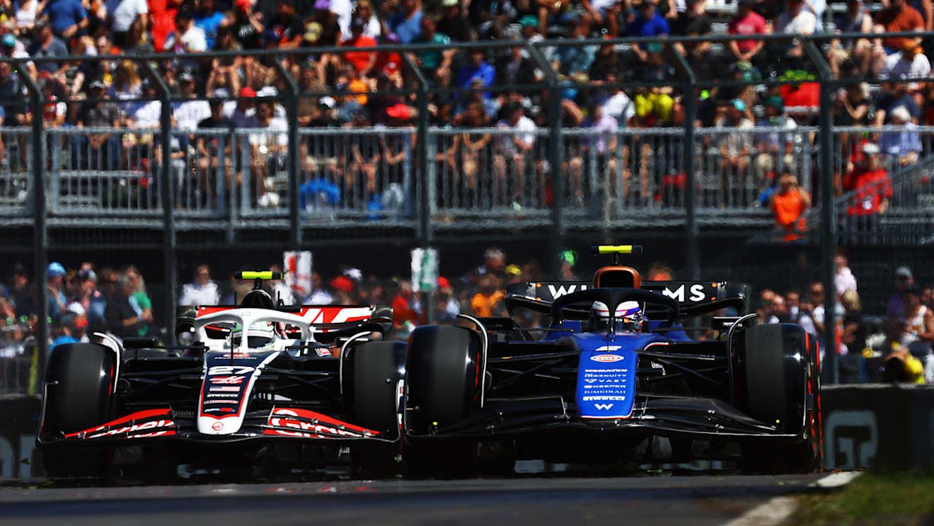 MONTREAL, QUEBEC - JUNE 07: Logan Sargeant of United States driving the (2) Williams FW46 Mercedes leads Nico Hulkenberg of Germany driving the (27) Haas F1 VF-24 Ferrari on track during practice ahead of the F1 Grand Prix of Canada at Circuit Gilles Villeneuve on June 07, 2024 in Montreal, Quebec. (Photo by Mark Thompson/Getty Images)