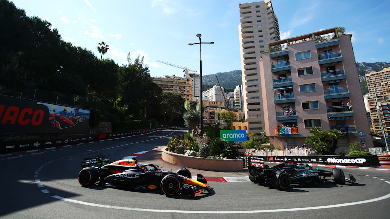 MONTE-CARLO, MONACO - MAY 26: George Russell of Great Britain driving the (63) Mercedes AMG Petronas F1 Team W15 leads Max Verstappen of the Netherlands driving the (1) Oracle Red Bull Racing RB20 on track during the F1 Grand Prix of Monaco at Circuit de Monaco on May 26, 2024 in Monte-Carlo, Monaco. (Photo by Joe Portlock - Formula 1/Formula 1 via Getty Images)