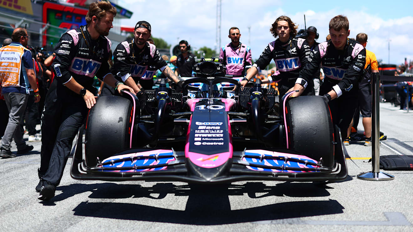 BARCELONA, SPAIN - JUNE 23: Pierre Gasly of France and Alpine F1 is pushed into position on the grid prior to the F1 Grand Prix of Spain at Circuit de Barcelona-Catalunya on June 23, 2024 in Barcelona, Spain. (Photo by Clive Rose - Formula 1/Formula 1 via Getty Images)