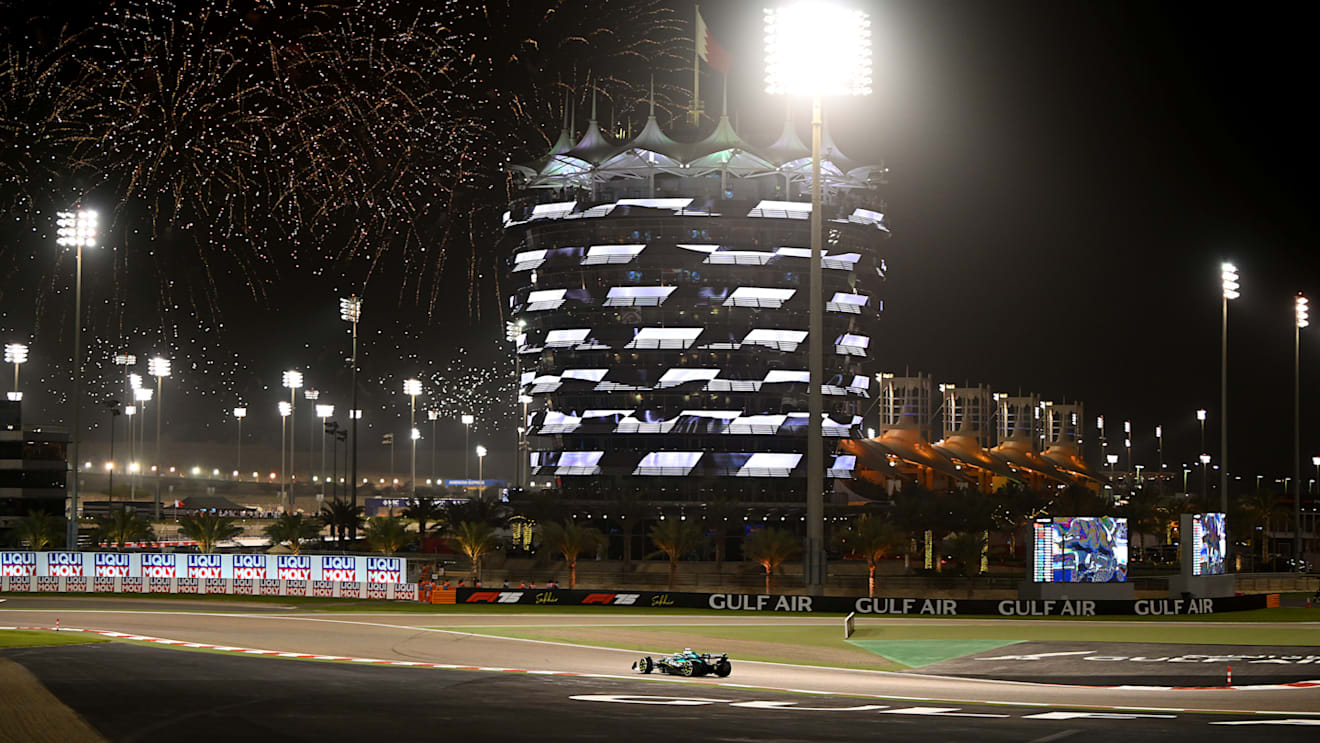 BAHRAIN, BAHRAIN - APRIL 13: Fireworks light the sky as Lance Stroll of Canada driving the (18) Aston Martin F1 Team AMR25 Mercedes heads to parc ferme during the F1 Grand Prix of Bahrain at Bahrain International Circuit on April 13, 2025 in Bahrain, Bahrain. (Photo by Clive Mason/Getty Images)