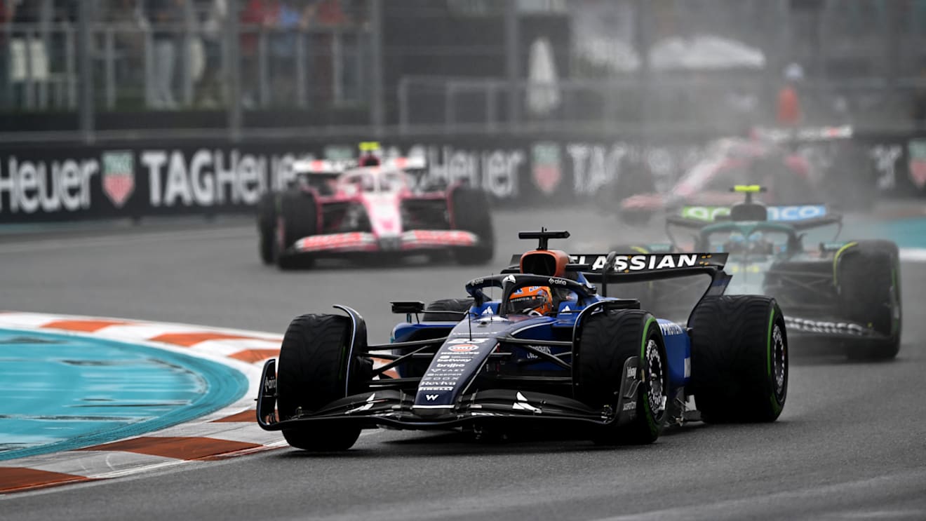 MIAMI, FLORIDA - MAY 03: Alexander Albon of Thailand driving the (23) Williams FW47 Mercedes leads Fernando Alonso of Spain driving the (14) Aston Martin F1 Team AMR25 Mercedes and Liam Lawson of New Zealand driving the (30) Visa Cash App Racing Bulls VCARB 02 on track during the Sprint ahead of the F1 Grand Prix of Miami at Miami International Autodrome on May 03, 2025 in Miami, Florida. (Photo by Rudy Carezzevoli/Getty Images)