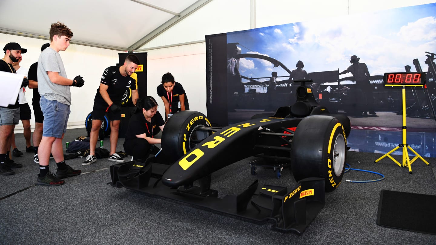 MELBOURNE, AUSTRALIA - MARCH 12: Fans take part in the Pirelli Pitstop Challenge in the fan area