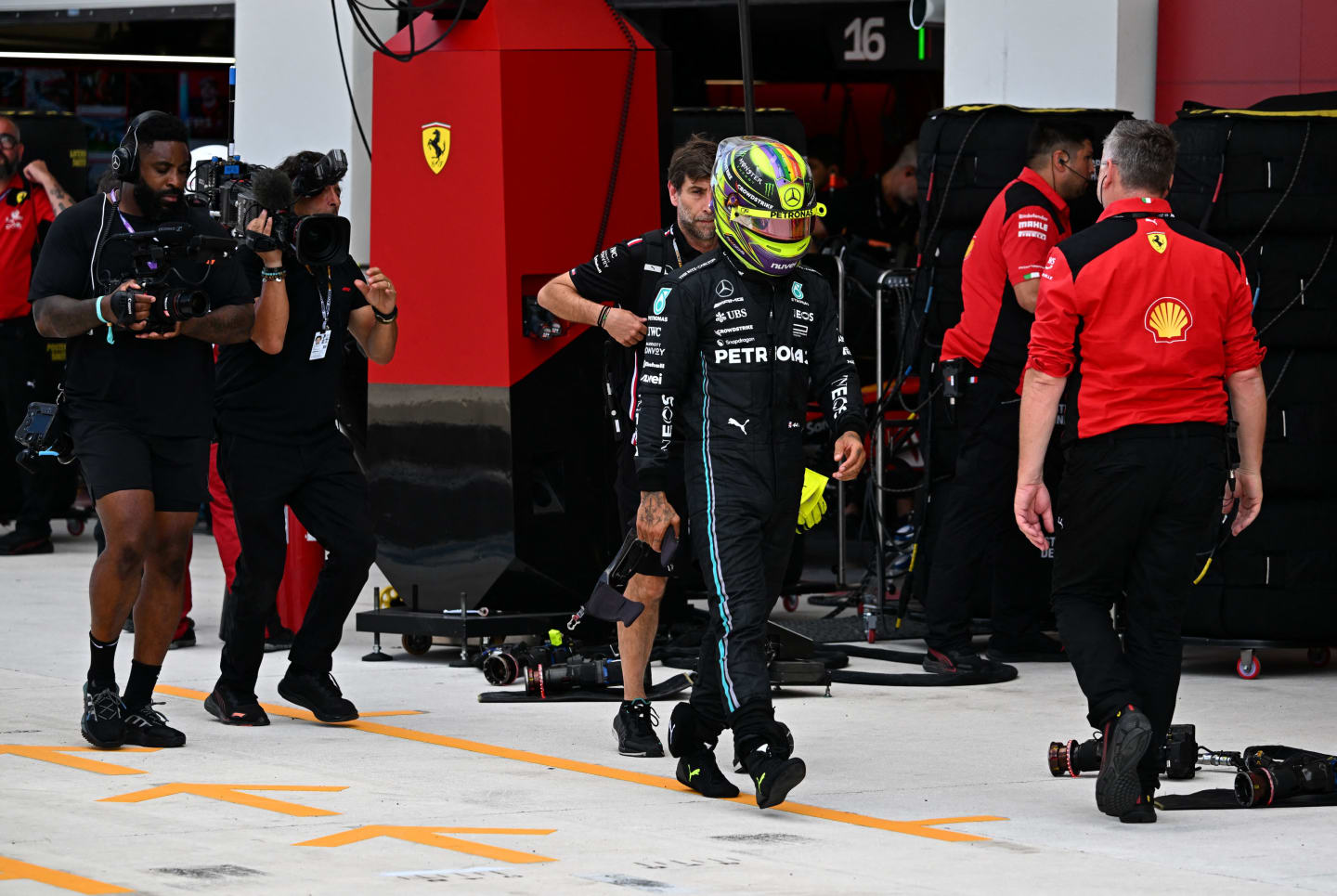 Mercedes' British driver Lewis Hamilton walk to a weigh in after the qualifying session for the 2023 Miami Formula One Grand Prix at the Miami International Autodrome in Miami Gardens, Florida, on May 6, 2023. (Photo by CHANDAN KHANNA / POOL / AFP) (Photo by CHANDAN KHANNA/POOL/AFP via Getty Images)