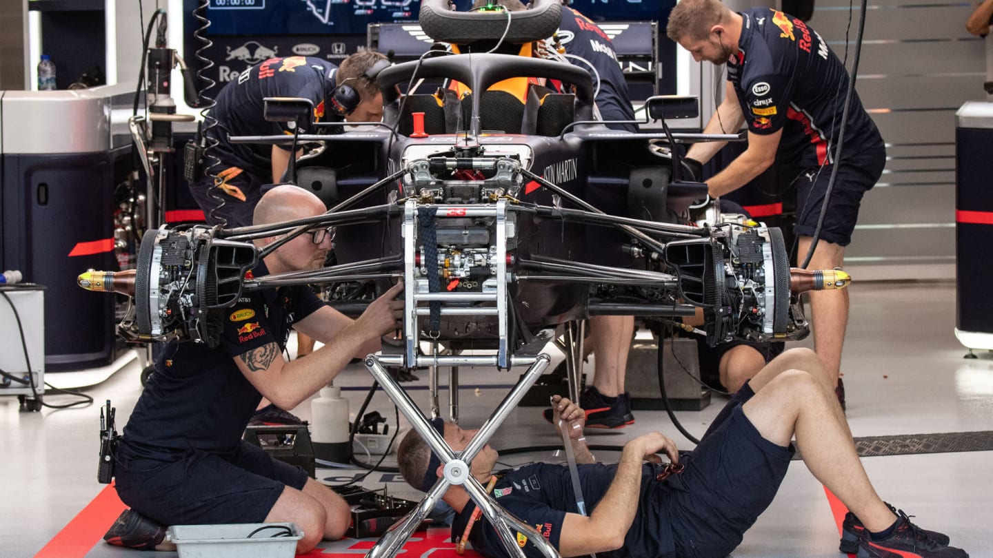 Mechanics prepare Red Bull's Dutch driver Max Verstappen's car in the Formula 1 pit area