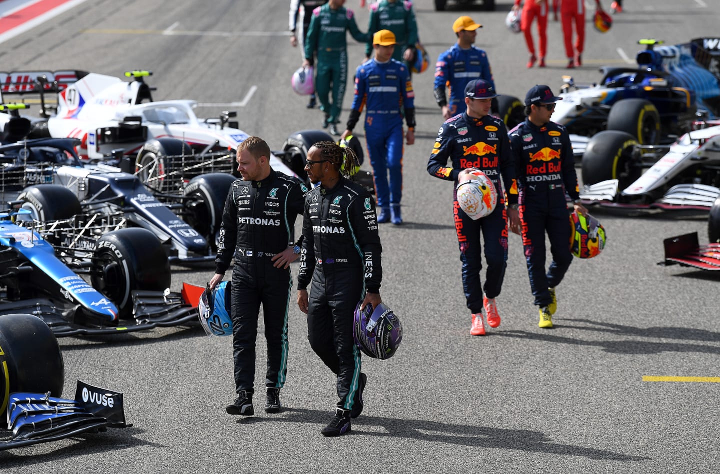 BAHRAIN, BAHRAIN - MARCH 12: Lewis Hamilton and Valtteri Bottas of Mercedes pose on the grid during