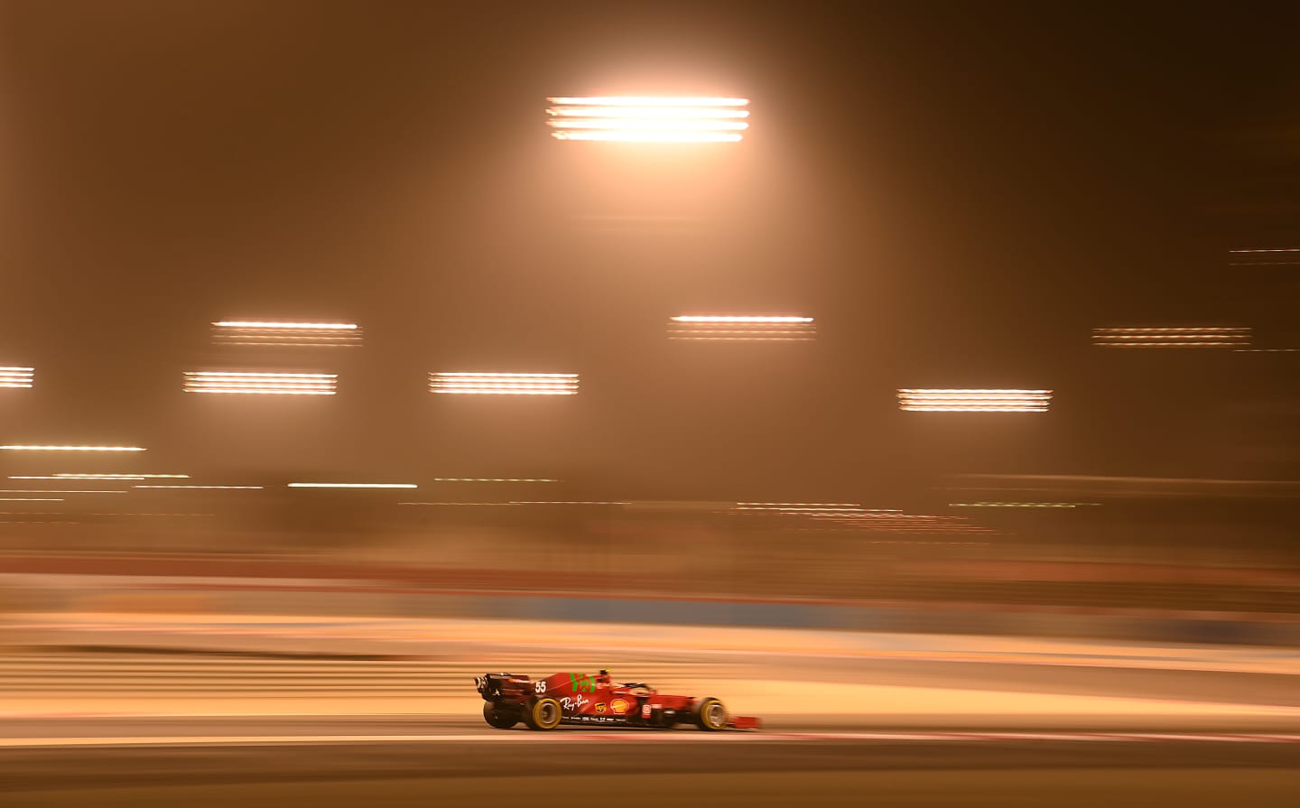 BAHRAIN, BAHRAIN - MARCH 12: Carlos Sainz of Spain driving the (55) Scuderia Ferrari SF21 shortly