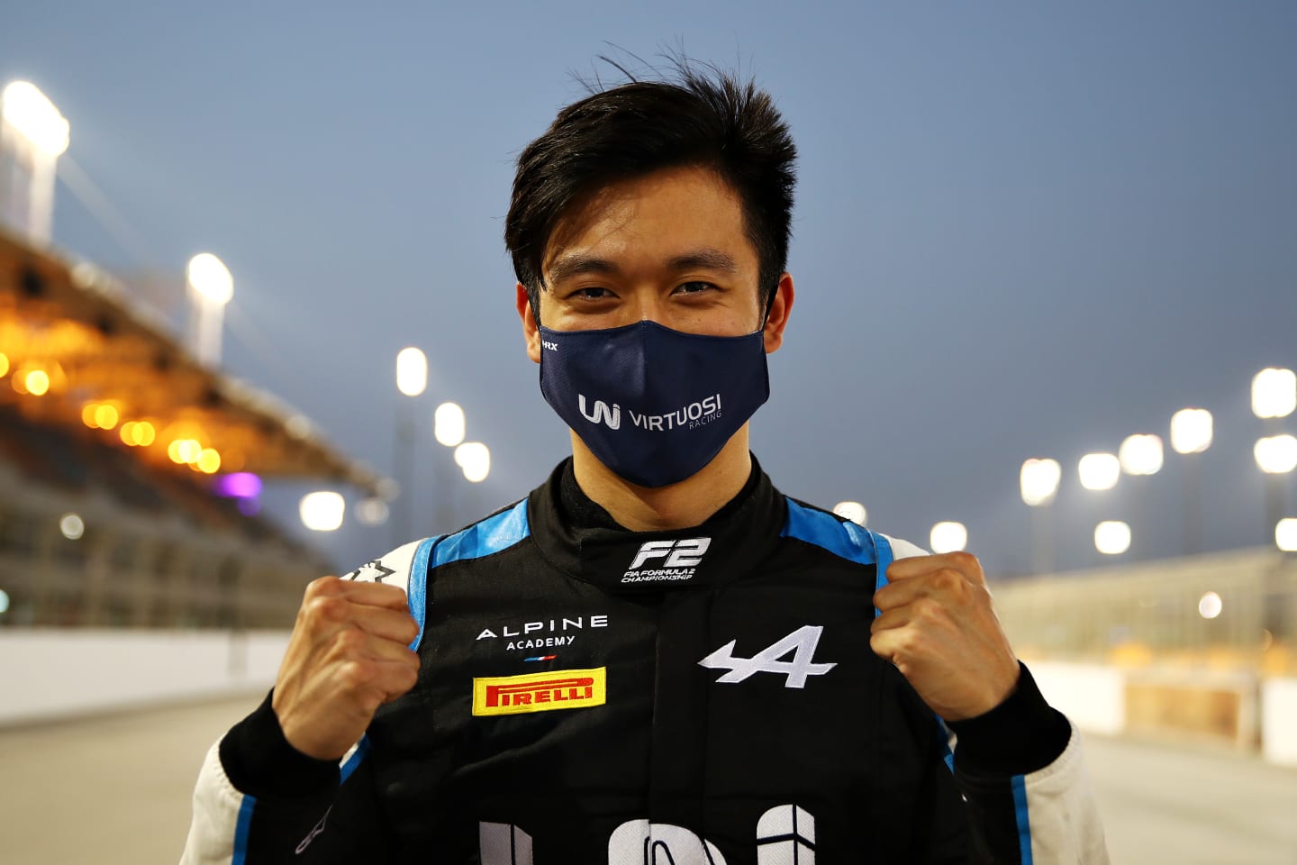 BAHRAIN, BAHRAIN - MARCH 26: Pole position qualifier Guanyu Zhou of China and UNI-Virtuosi Racing