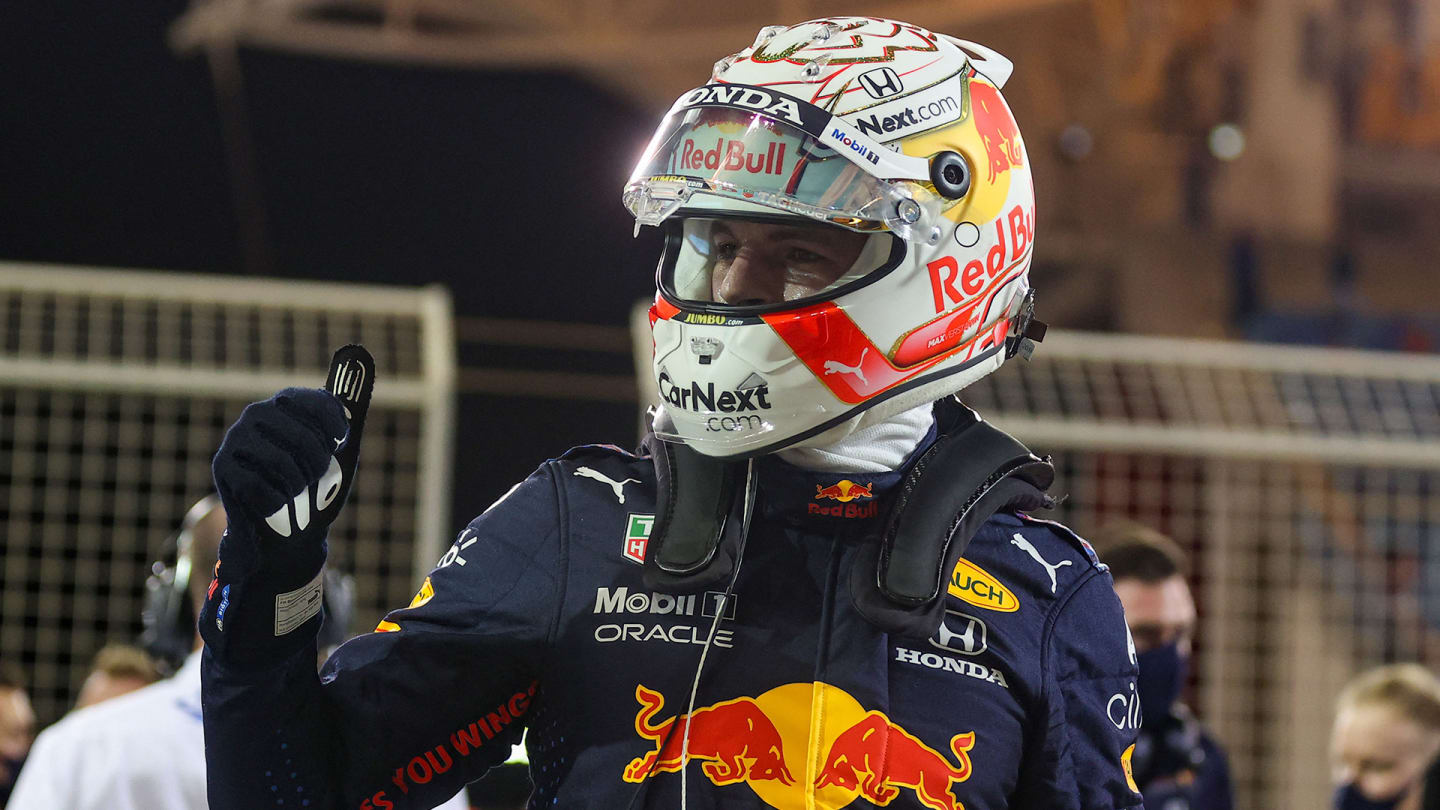 Red Bull's Dutch driver Max Verstappen celebrates pole position after the qualifying session on the