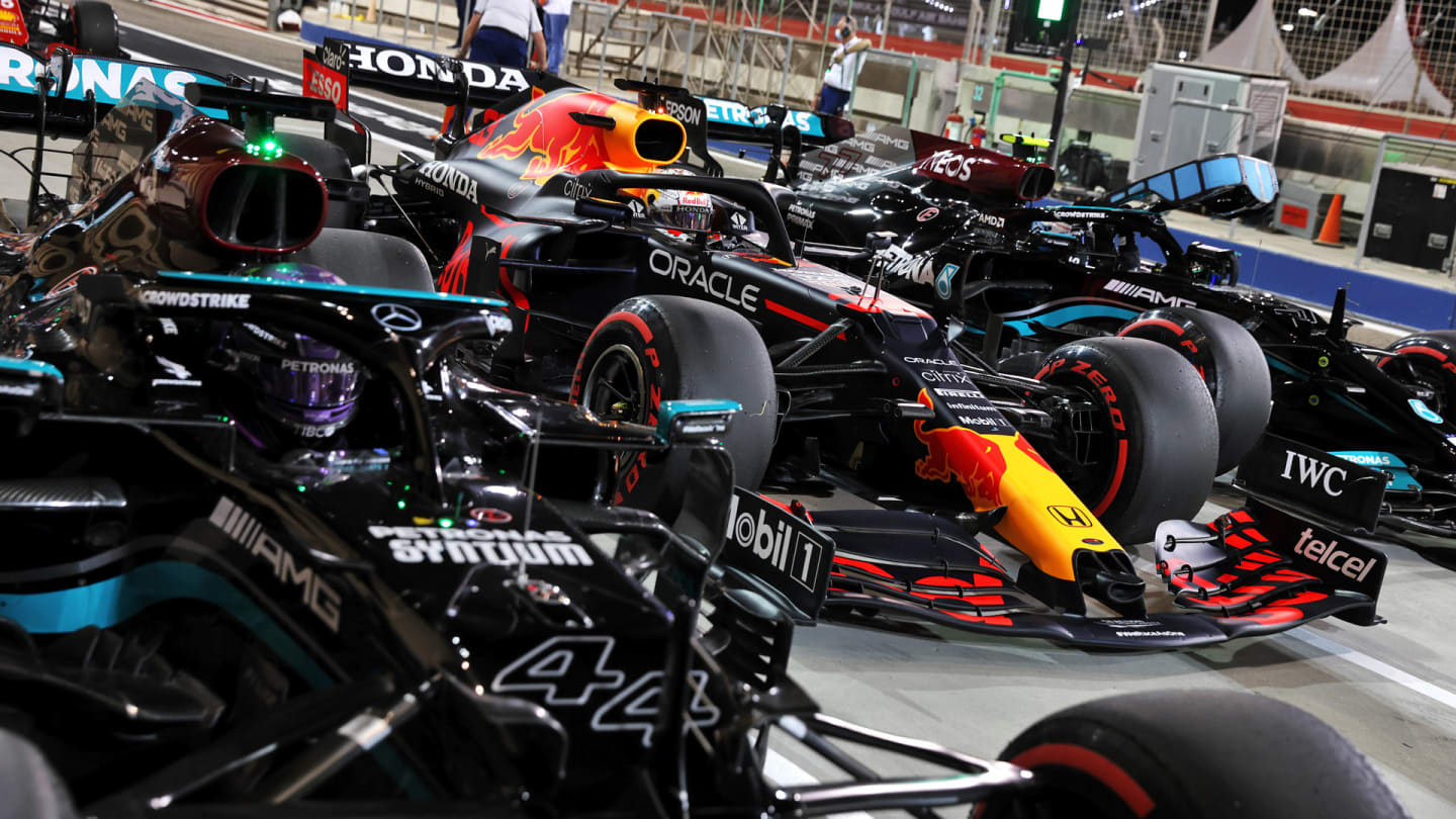 Lewis Hamilton (GBR) Mercedes AMG F1 W12; Max Verstappen (NLD) Red Bull Racing RB16B; and Valtteri