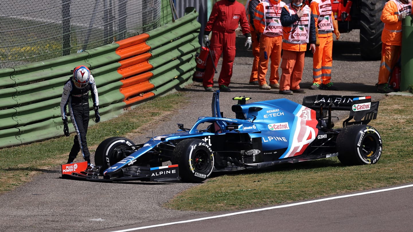 IMOLA, ITALY - APRIL 16: Esteban Ocon of France and Alpine F1 Team inspects his car after stopping on track during practice ahead of the F1 Grand Prix of Emilia Romagna at Autodromo Enzo e Dino Ferrari on April 16, 2021 in Imola, Italy. (Photo by Lars Baron/Getty Images)
