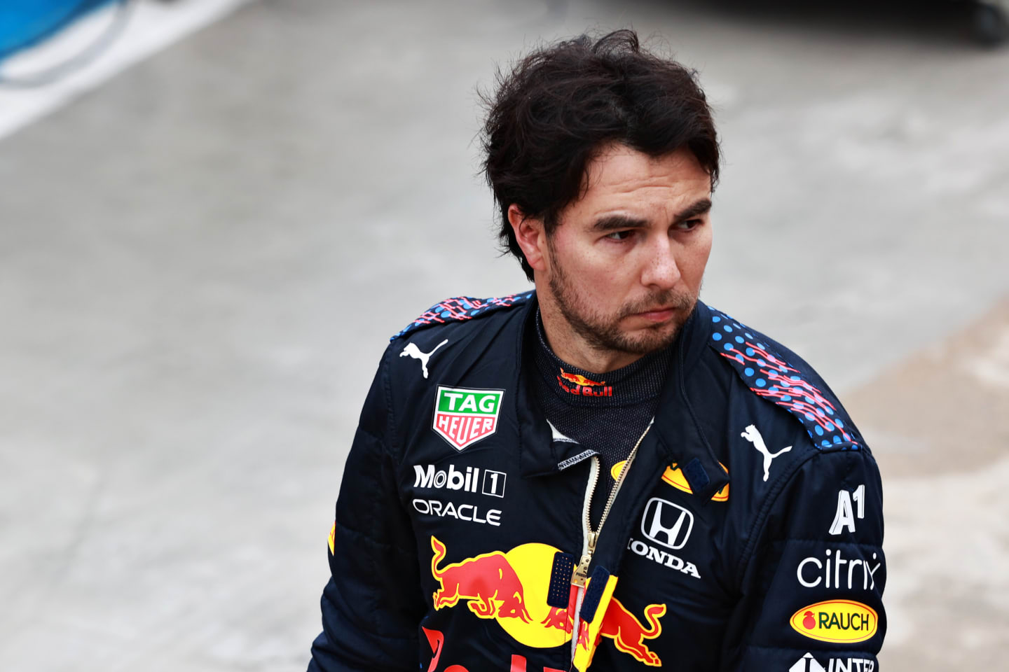 IMOLA, ITALY - APRIL 18: Sergio Perez of Mexico and Red Bull Racing looks on in the Pitlane during