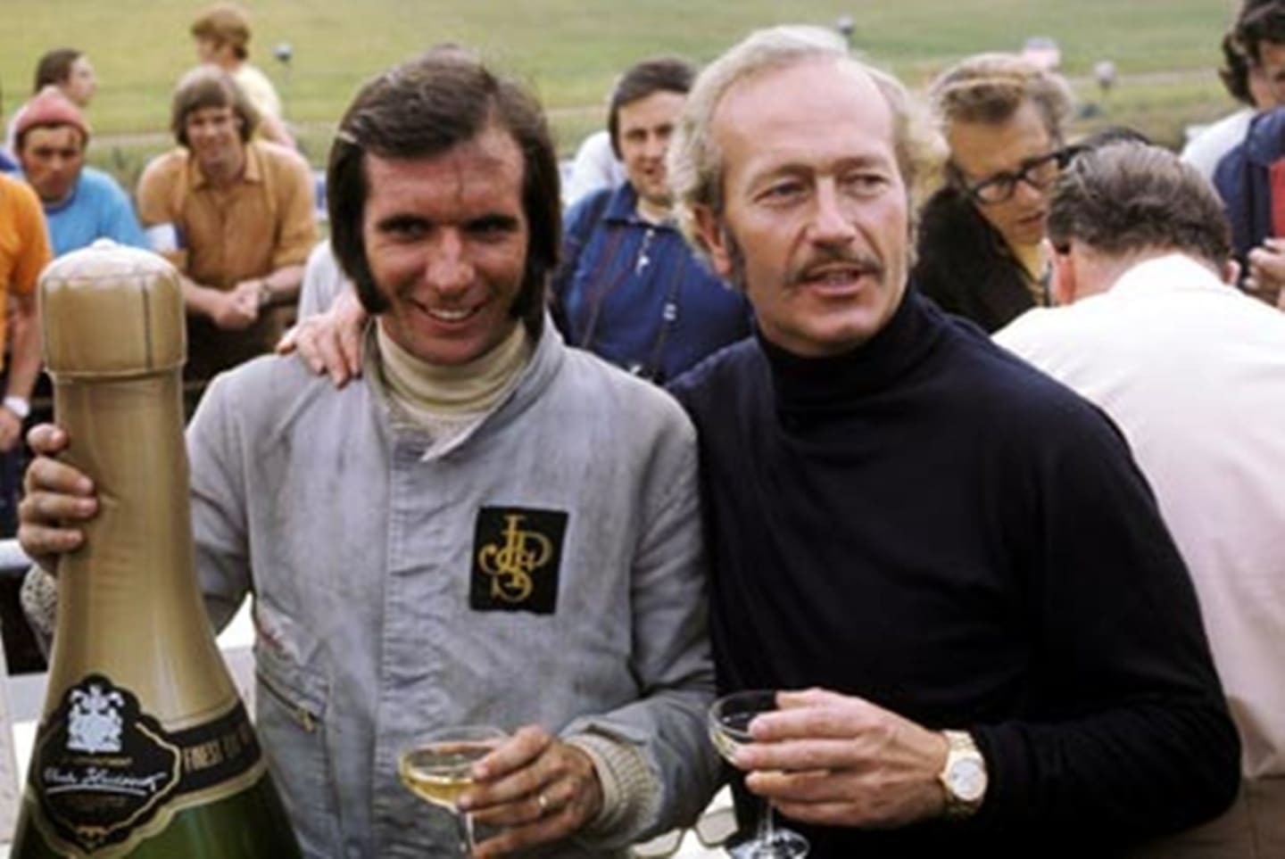 Brands Hatch, July 1972: Emerson Fittipaldi celebrates with Lotus team boss Colin Chapman following