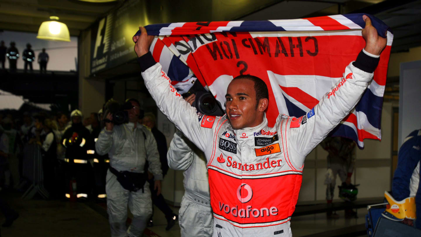 Lewis Hamilton (GBR) McLaren celebrates his World Championship in parc ferme.

Formula One World