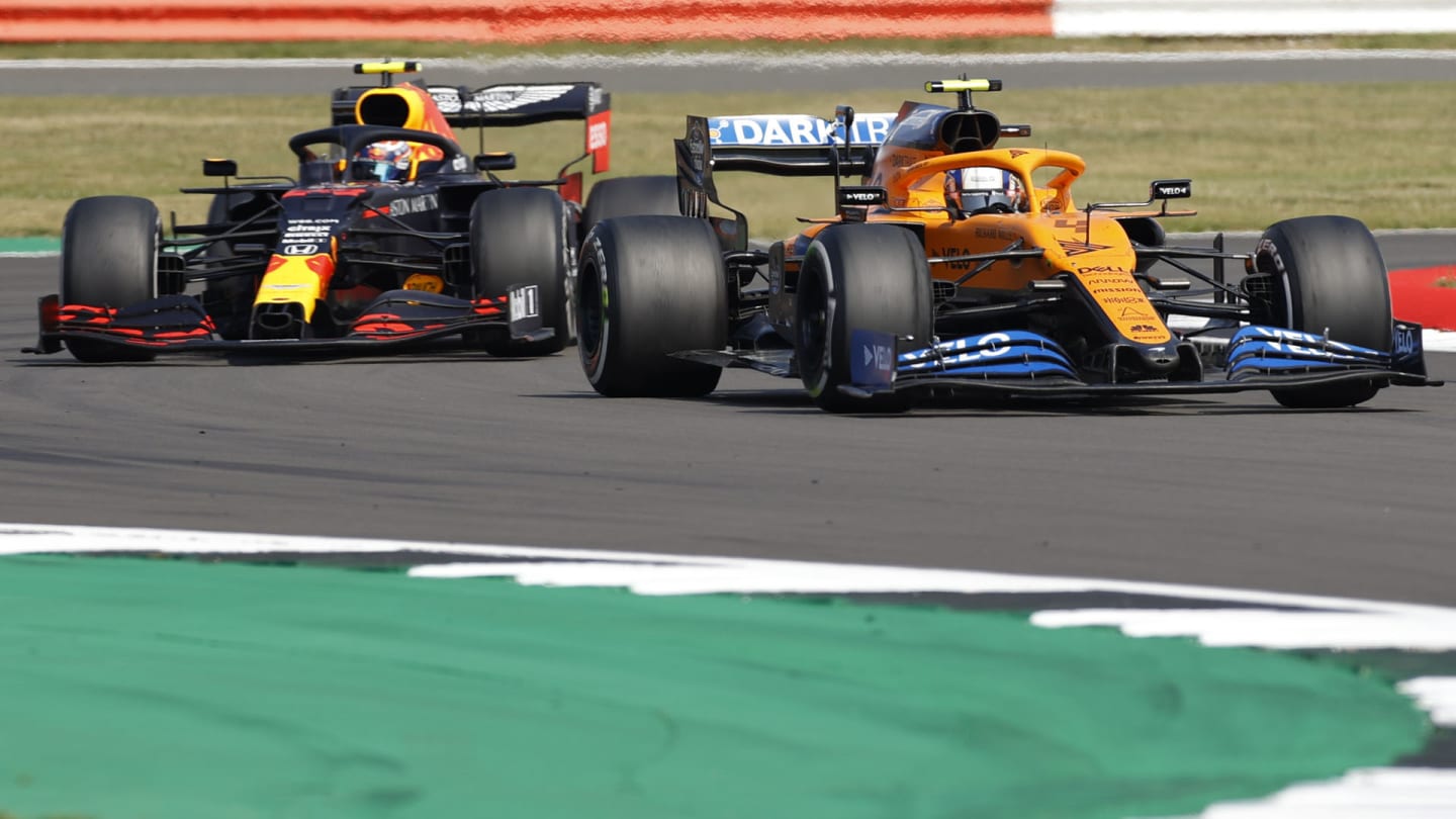Formula One F1 - 70th Anniversary Grand Prix - Silverstone Circuit, Silverstone, Britain - August 9, 2020 McLaren's Lando Norris and Red Bull's Alexander Albon in action during the race Pool via REUTERS/Andrew Boyers